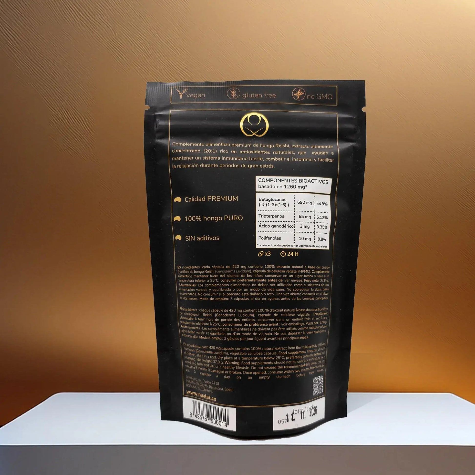 Parte trasera del envase de Extracto de Reishi NUALAT mostrando ingredientes, componentes bioactivos y certificaciones de calidad premium.